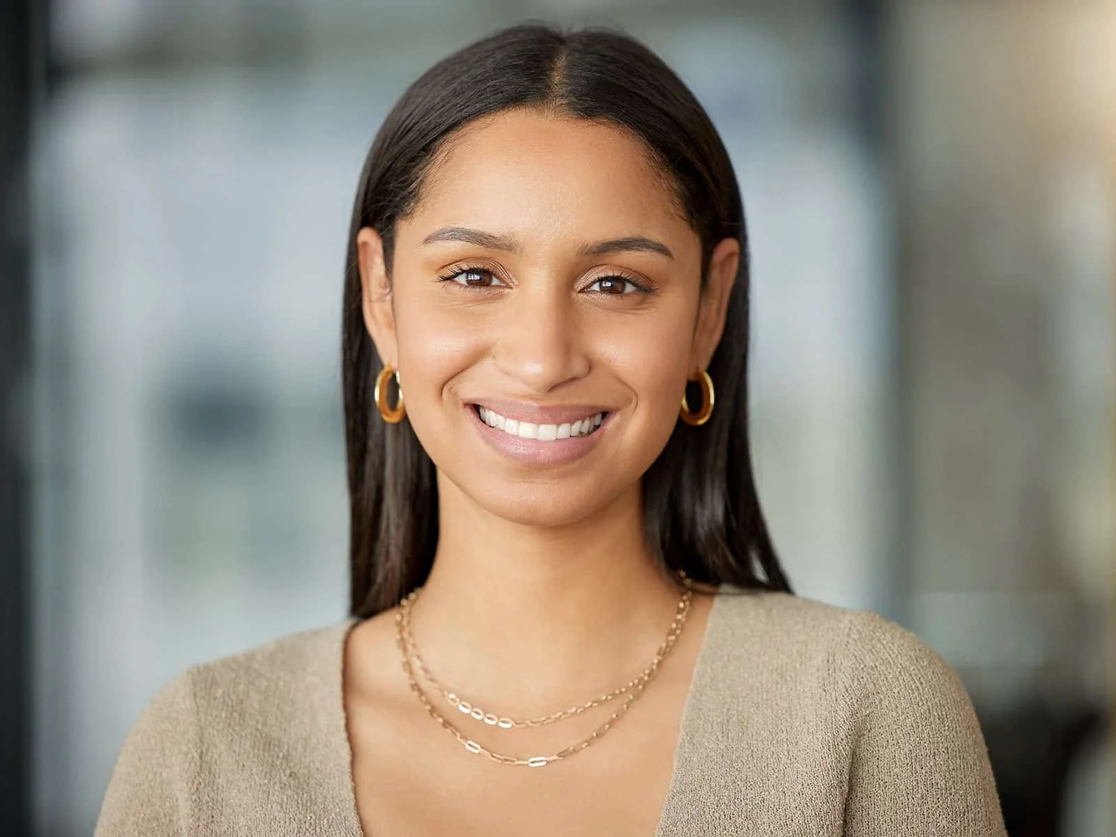 Young-Beautiful-Woman-with-Earings-Smiling by Hill Dental Acquisitions LLC, DBA Smile On Dental Studio in Richmond Heights, MO